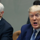President Donald Trump speaks about the coronavirus response next to Vice President Mike Pence during a coronavirus briefing with health insurers in the Roosevelt Room at the White House, on March 10, 2020.